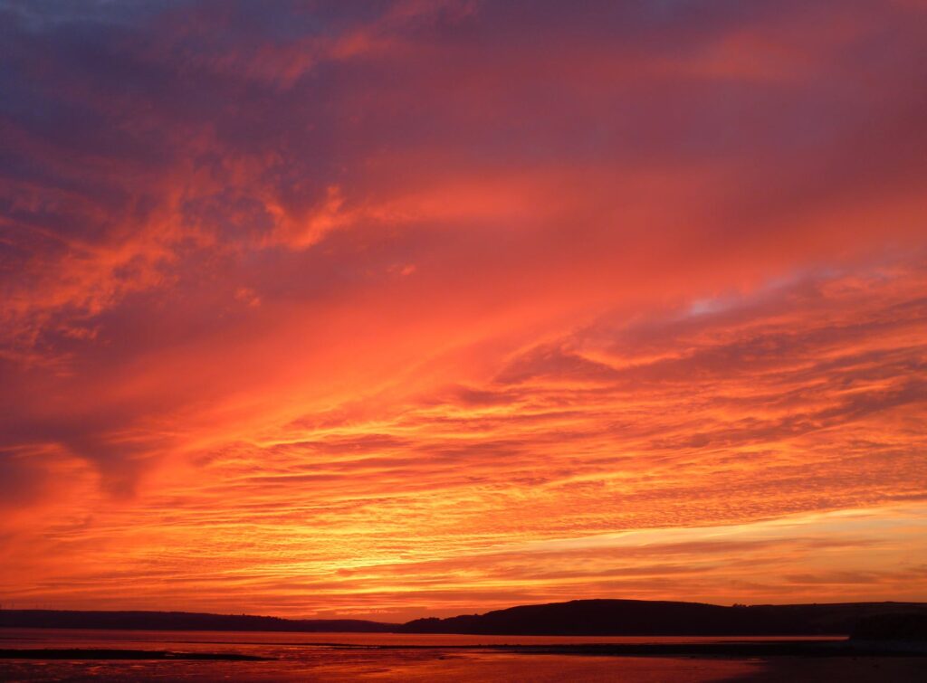 mountains under red skies
