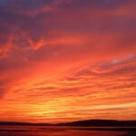 mountains under red skies