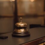close up of gold bell on desk