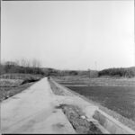 ditch stretching along a country road