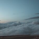 white clouds near roadway
