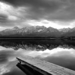 gray scale photo of body of water