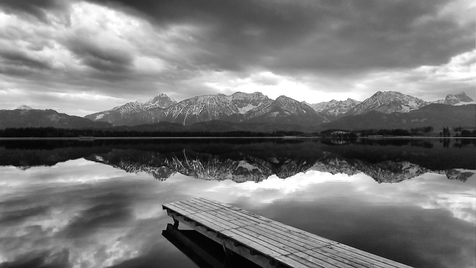 gray scale photo of body of water