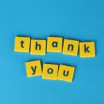 yellow letter tiles on blue background