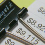 a close up shot of a document with a binder clip